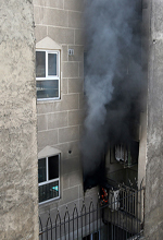 عکس خبري -گزارش تصويري/ آتش سوزي منزل مسکوني در خيابان شکوفه