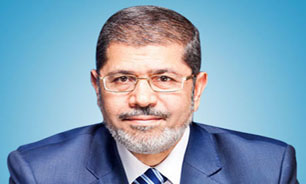 عکس خبري -مرسي هرگونه مداخله نظامي در سوريه را رد کرد 